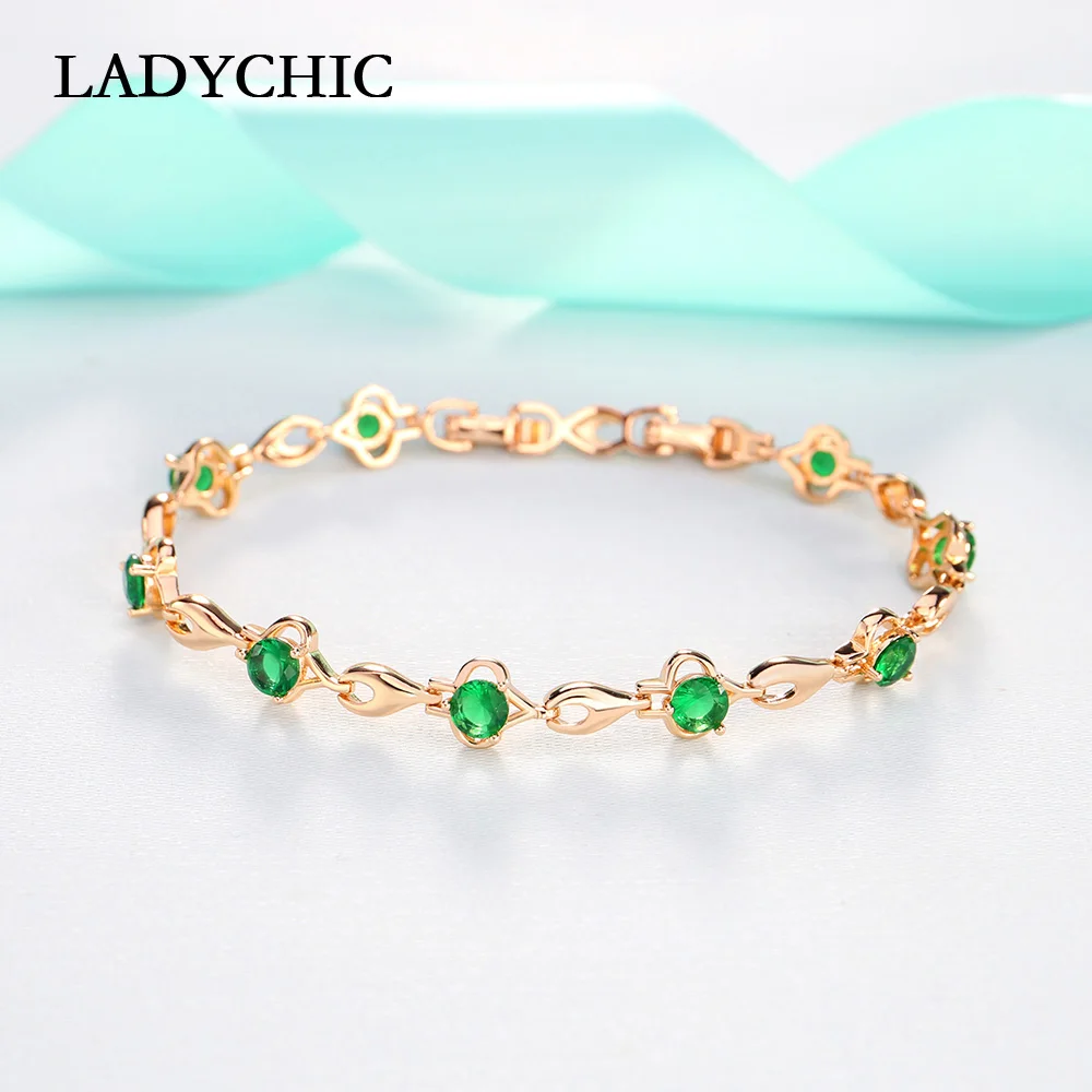 Женский браслет LADYCHIC с кубическим цирконием золотого цвета шармами зелеными