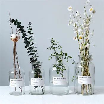 

Minimalist Chic Glass Storage Jars Scandinavian Vogue Elegance Transparent Desk Storage Bottle Organizer Flower Container Decor