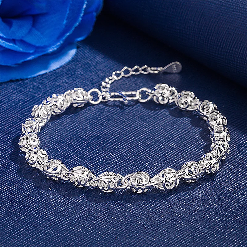 

European and American silver ornaments hollow linglinground ball player chain, empty player chain
