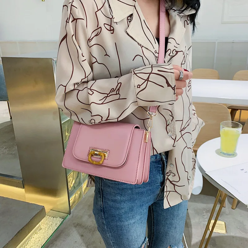 

Women's New Summer 2009 Fashion Lock Small Fang Bao Korean Edition Simple and Big One Shoulder Slant Women's Bag