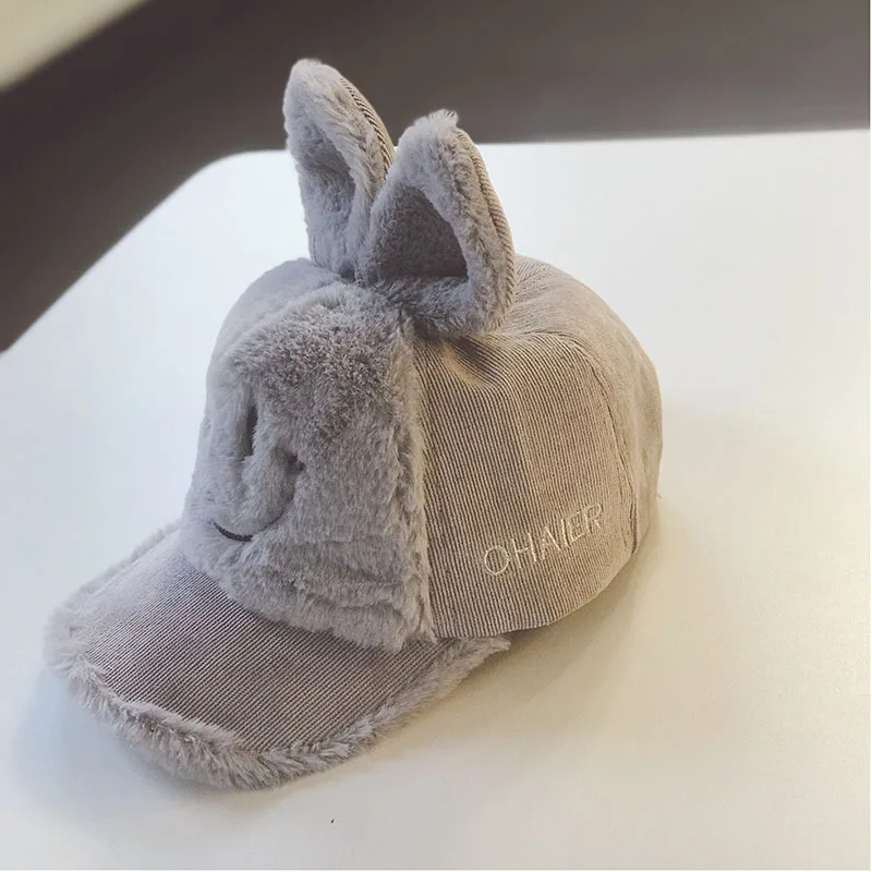 Baby baseball cap for boys and girls autumn and winter tide warm Korean version cute rabbit ears lamb down cap