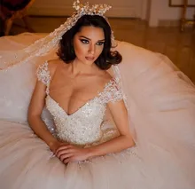 Vestidos De Mariee Princess Pearls Beads Wedding Dresses Sheer Tulle Jewel Neck Lace Appliques Puffy Dubai Bridal Gown