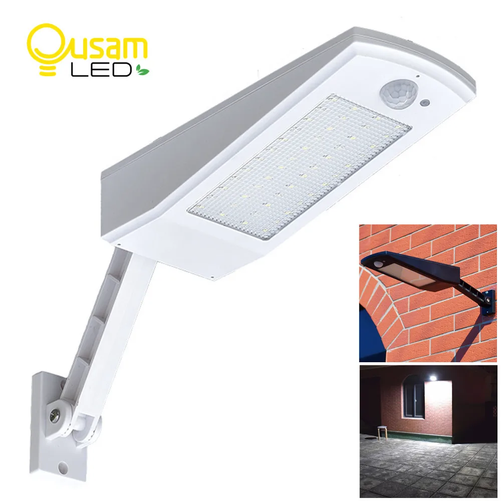 Lampe Solaire Exterieur/Interieur, 900lm Blanc Lampe Solaire Exterieur  Detecteur de Mouvement, 4 Mode Lampe Solaire Puissante, Lumière Solaire  avec Télécommande IP65 Étanche pour Jardin/Garage