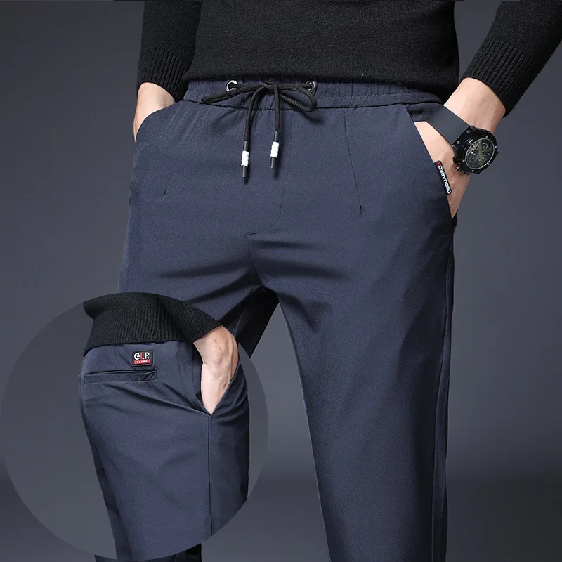Осень и зима стиль Slim Fit эластичность обтягивающие повседневные быстросохнущие брюки мужские