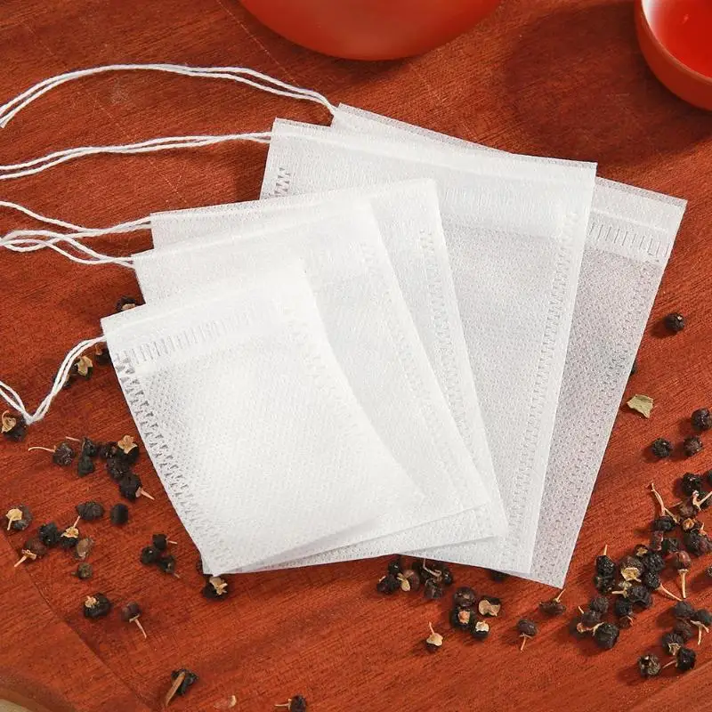 

50/100pcs Non-woven Tea Bags Reusable Empty Scented Drawstring Pouch Seal Filter Cook Herb Spice Pouch Home Storage Bags
