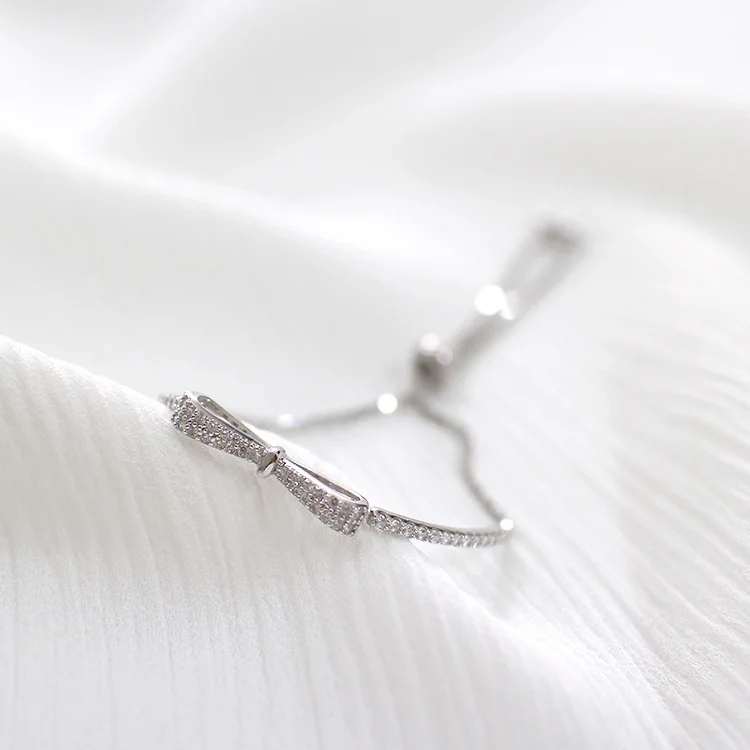 

Sa123 Korean-style Silver S925 Fine Silver Fashion xue sheng kuan Bow Micro Zircon Regulation Beads Bracelet Hand Jewelry