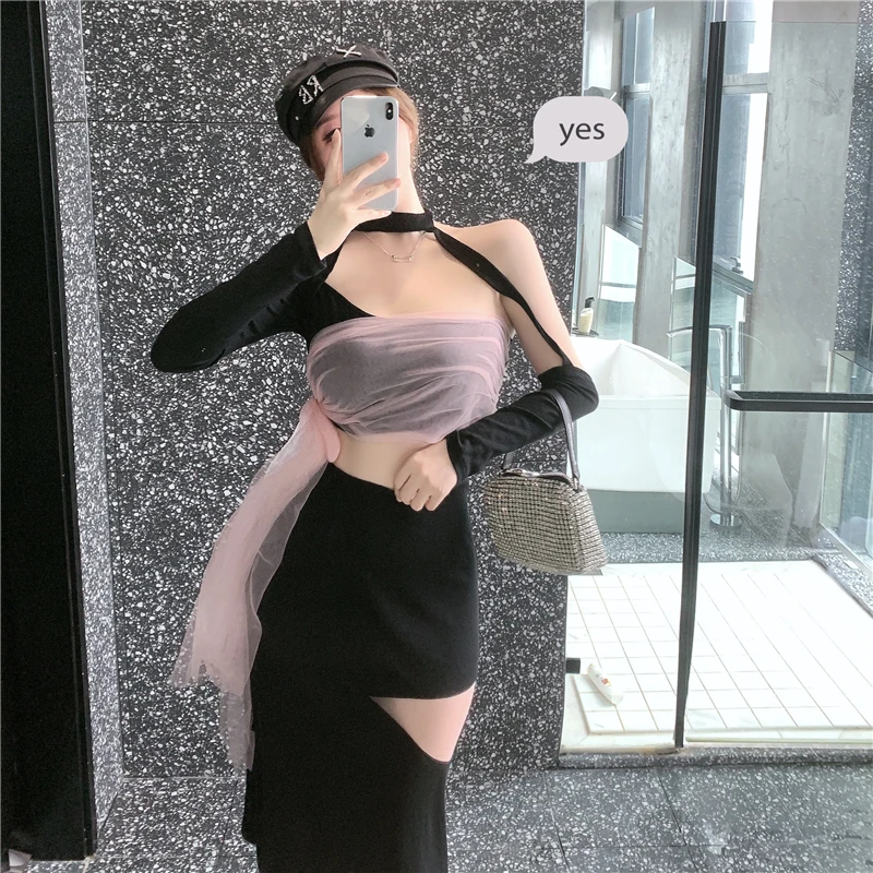 

Spring and Autumn Halter Neck Mesh Long Sleeve T-shirt + High Waist Hollow Skirt Two-piece Fashion Suit