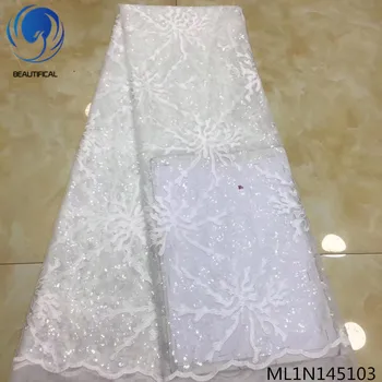 

Beautifical african lace fabrics White tulle lace fabric embroidery sequins lace fabric Hot sale nigerian fabric ML1N1451