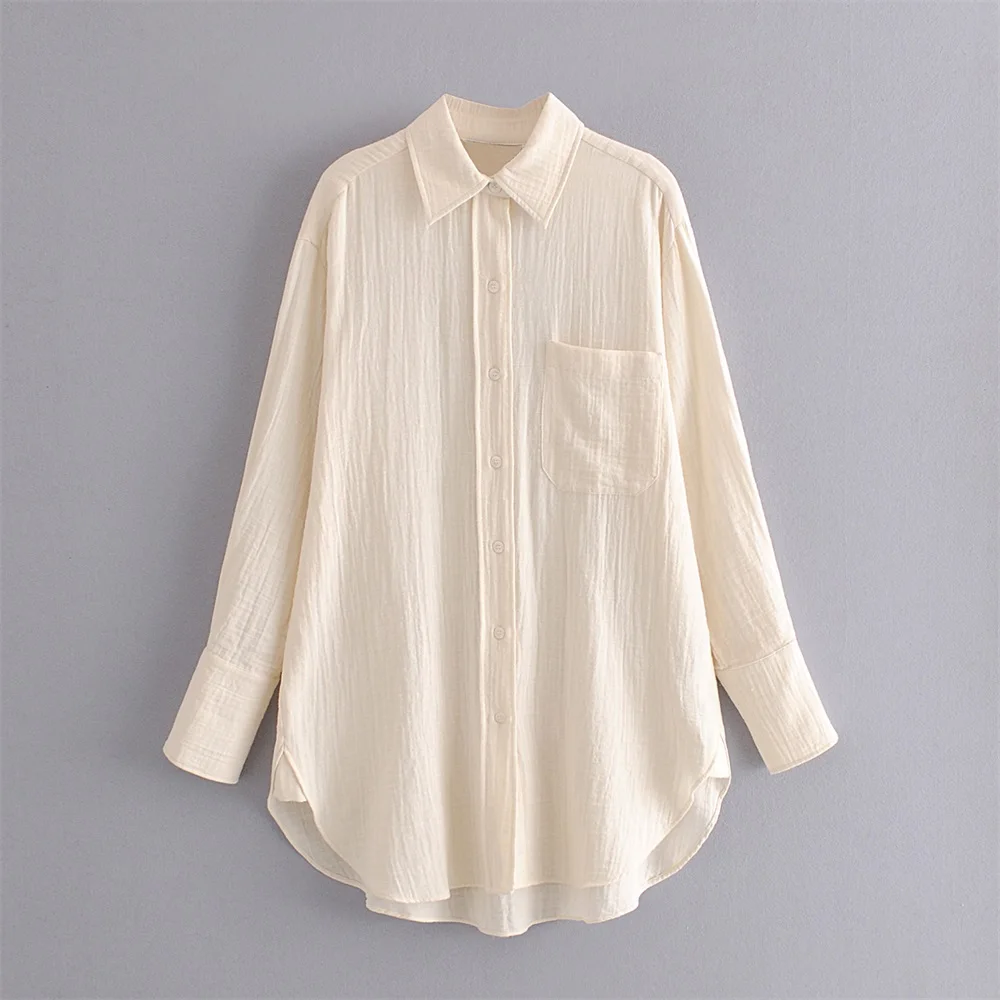 

2020 summer new women's solid color lapel pocket decoration texture lazy casual loose version of the long shirt shirt