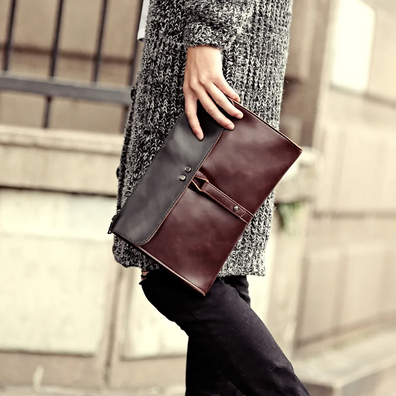

Korean version of the new men's hand bag iPad file retro trend color shoulder bags