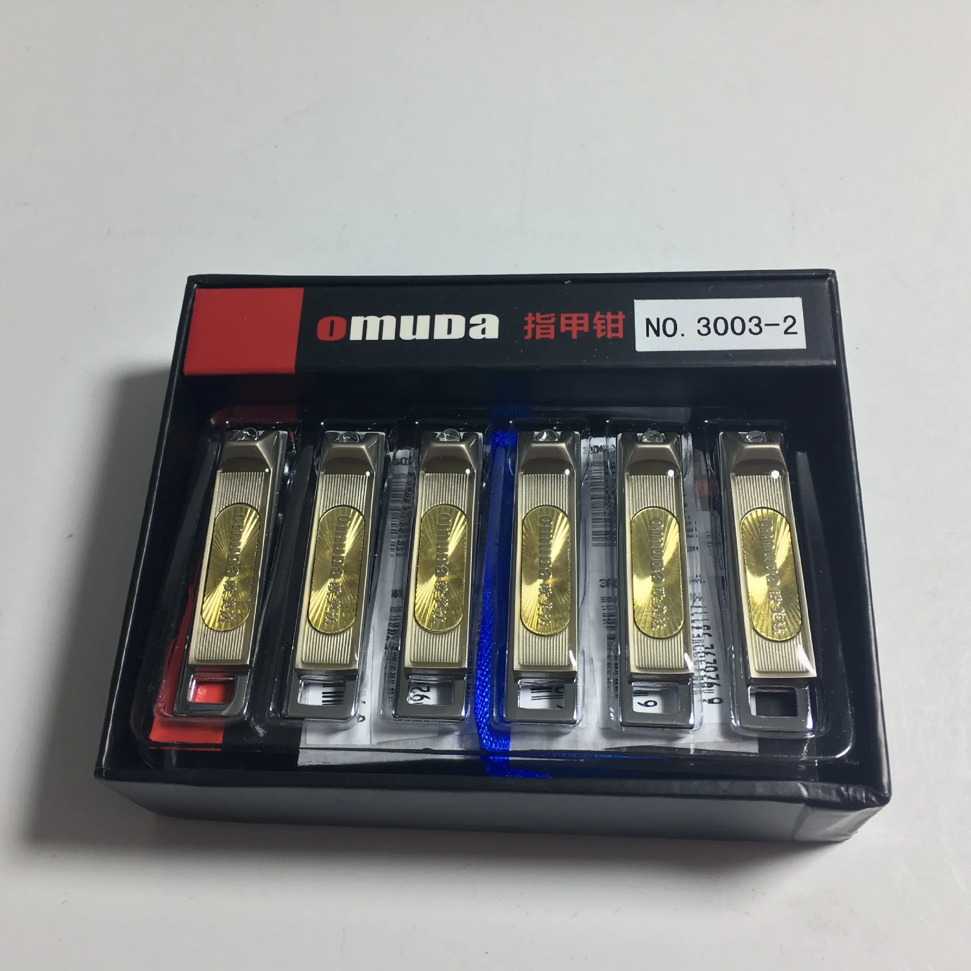 

Wholesale Omuda Nail Clippers 3003-2 Multi-Purpose Flat with File Small Ordinary Nail Clippers/Nail Scissors