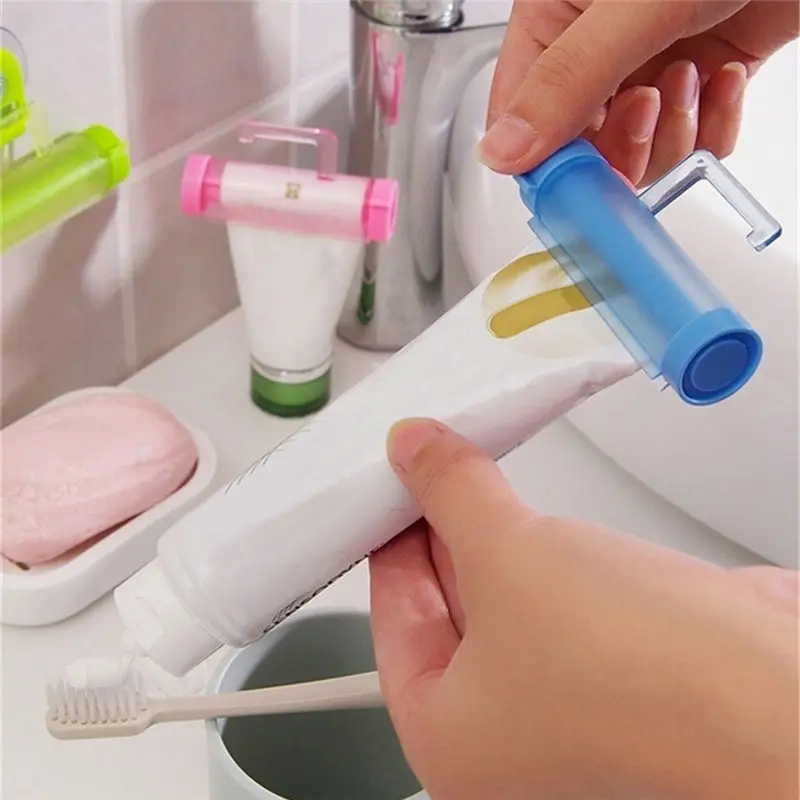

1Pc Rolling Squeezer Toothpaste Dispenser Tube Sucker Holder Dental Cream Bathroom Accessories Manual Syringe Gun Dispenser