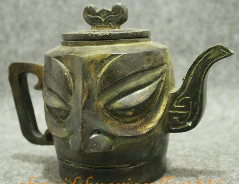 Старинная китайская бронза собрать sanxingdui человек лицо чайник-скульптура горшок для вина, кувшин для напитков
