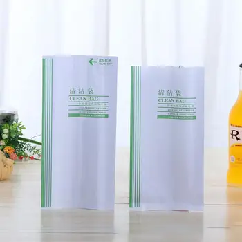 

100PCS Coated Film Paper Vomit Bags Portable Train Garbage Bags Disposable Emesis Bag Cutting Line Clean Paper Bag for Car Use