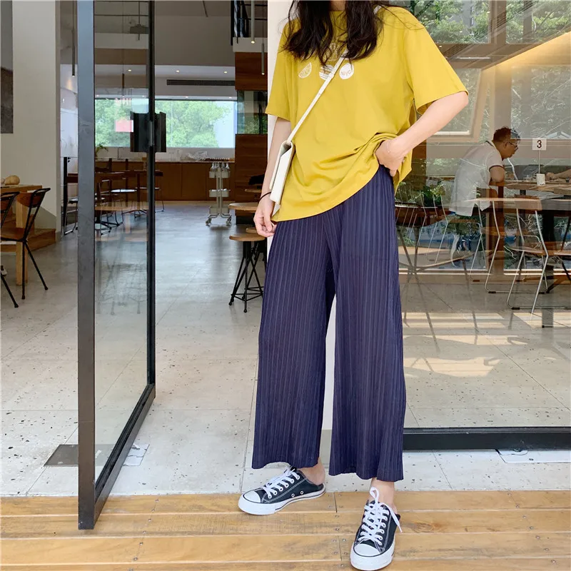 Miyake's loose slim wrinkled wide-legged pants and nine-minute pants free shipping