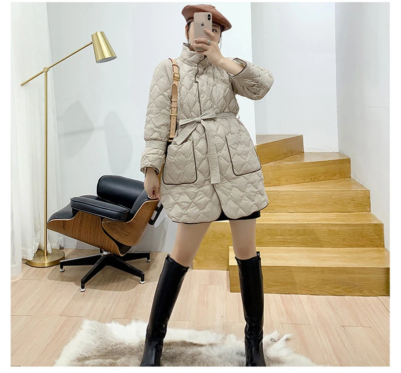 YNZZU Korean Style Spring Winter Mid-Long Light Women's Down Jacket Elegant White Duck Down Coat with Sashes Pockets A1391