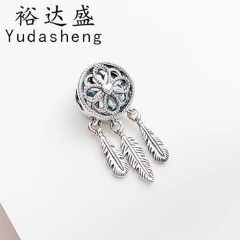 

Spiritual Dreamcatcher Charm features an intricate webbed floral centerpiece from which delicate feathers hang