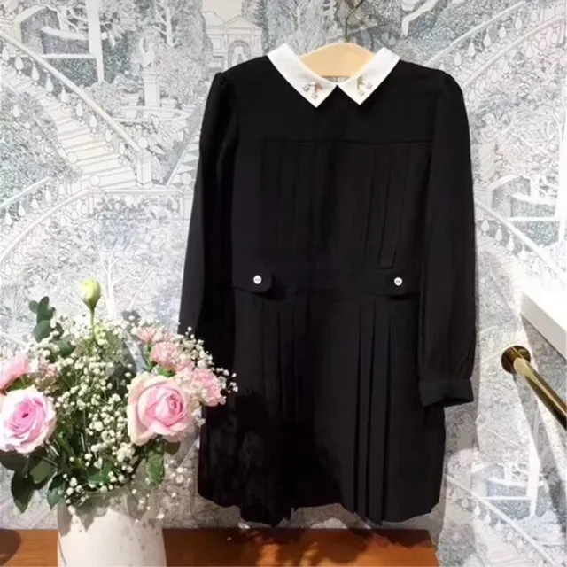girls black dress with white collar