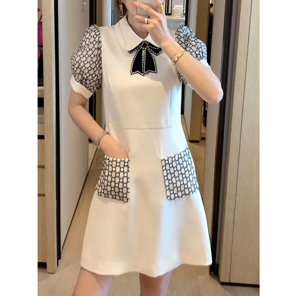 Женское плотное и тяжелое платье с бантом украшенное бисером летнее контрастных