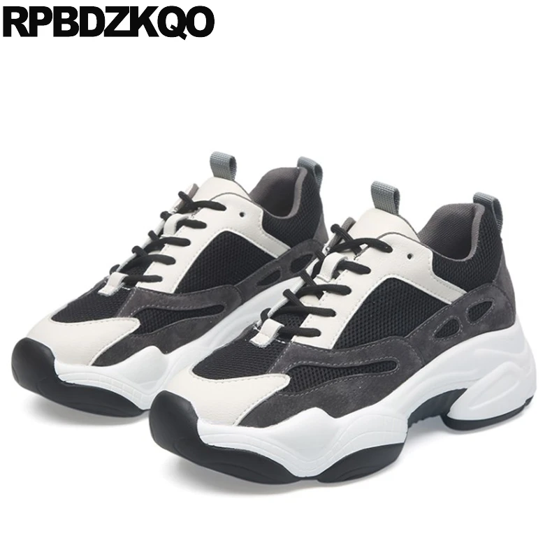 black thick sole trainers