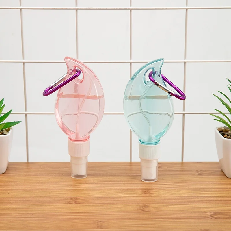 

50ml Travel Portable Leakproof Empty Refillable Container Travel Plastic Clear Keychain Bottle Leaf Shape Travel Spray Bottle