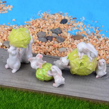 

Cartoon Holding Cabbage Jade Rabbit Models Cute Rowing Rabbit Anime Figure Car Decoration Daily Ornaments DIY Crafts Figma Dolls