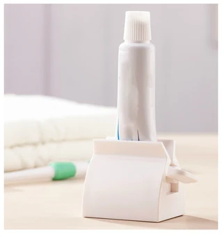 

Multifunctional Bathroom Plastic Cream Tube Squeezing Dispenser Rolling Tube Squeezer Tooth Paste Squeezer Toothpaste Dispenser