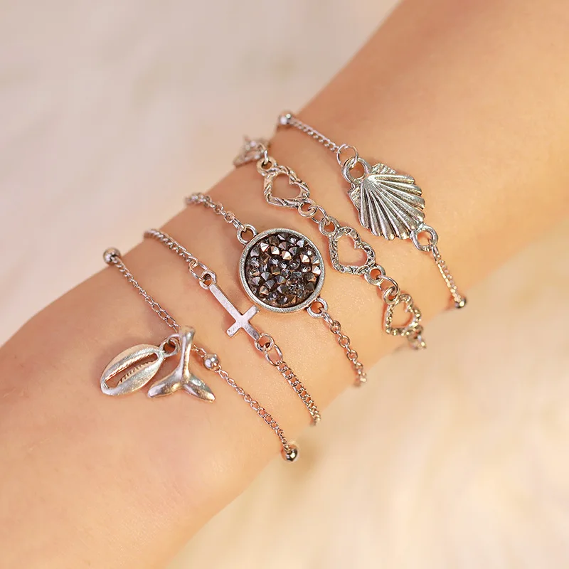 

Hot beach wind fashion shell bracelet set of five cross hollow love conch tail multi-element jewelry
