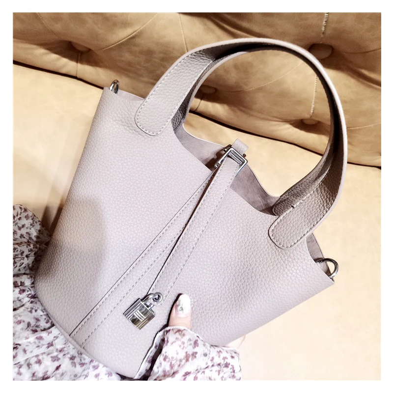 

2020 European and American new bucket bag lock handbag lady's bag large-capacity one-shoulder oblique span pu bag