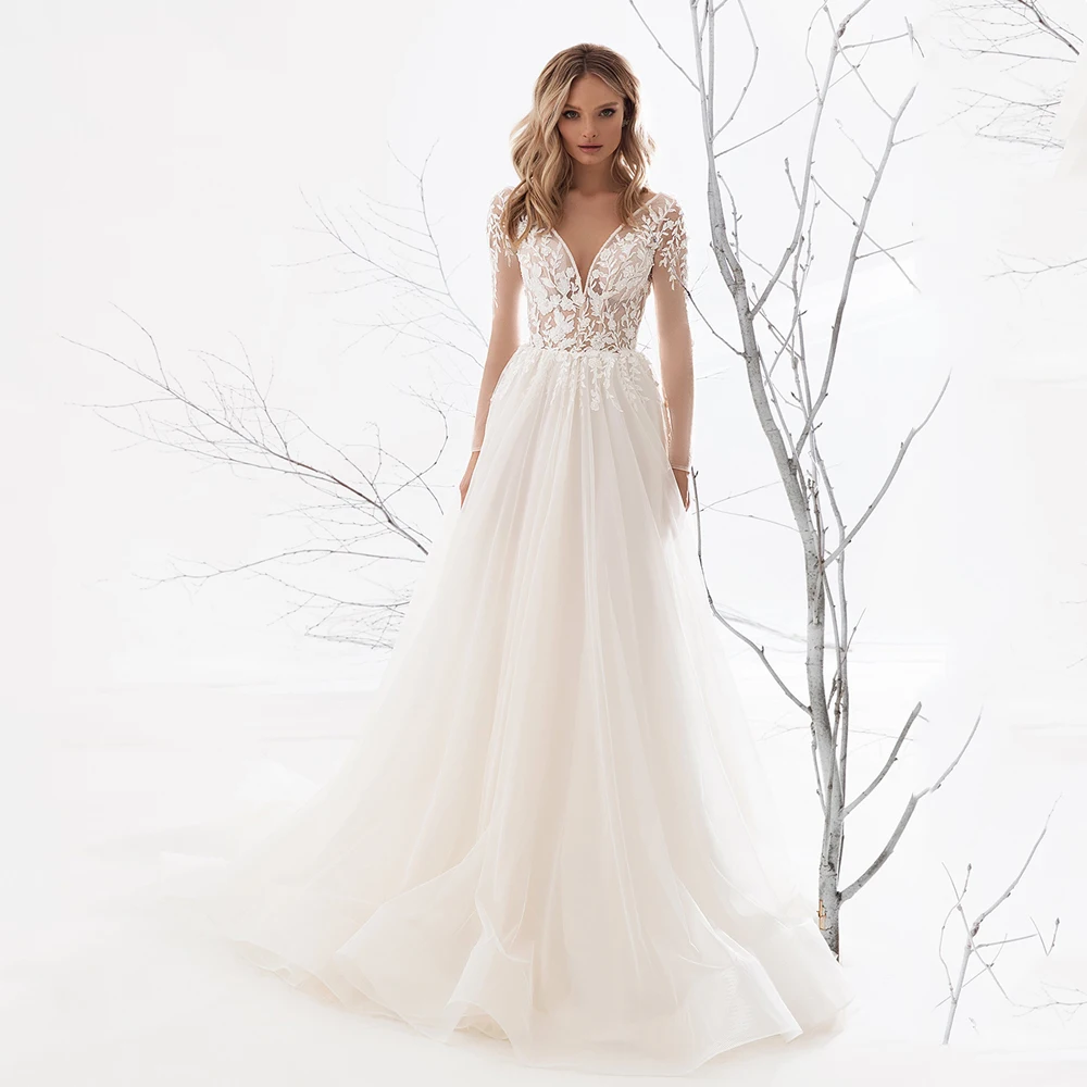 

Sexy See-through Wedding Dress V Neck Long Sleeves Lace Appliqued A Line Long Train Tulle Backless Bridal Dresses