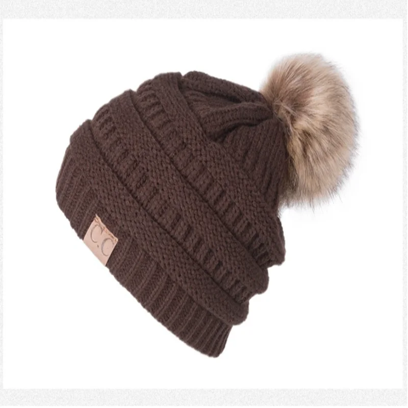 

European and American winter Hat Warm Knitted womens Hat Cute Earflaps Fluffy Ball Cap Pullover Cap Outdoor Warm Hat