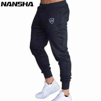 

2018 Men Gyms Long Pants Mid Cotton Men's Sporting Workout Fitness Pants Casual Fashion Sweatpants Jogger Pants Skinny Trousers