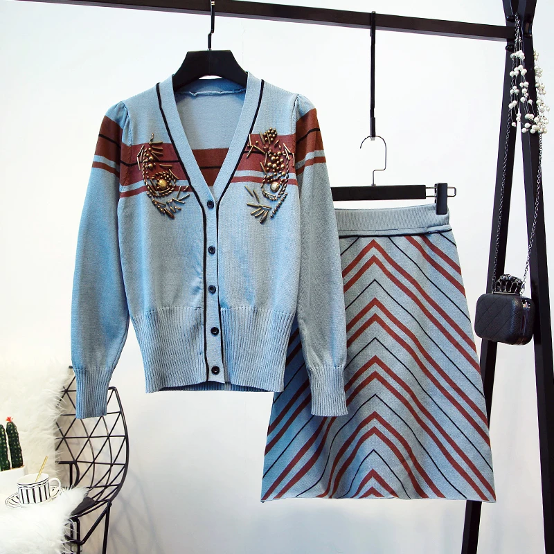 

2019 autumn and winter new Korean version of the two-piece knit rework bead cardigan stitching striped skirt suit women