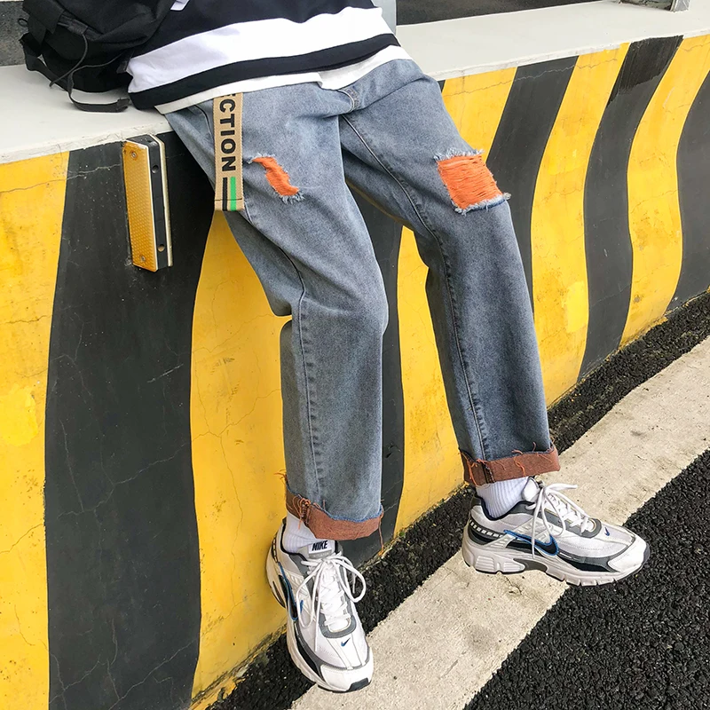 

Men's jeans 2020 spring and summer new handsome solid color hole loose nine points jeans young personality fashion trend men's