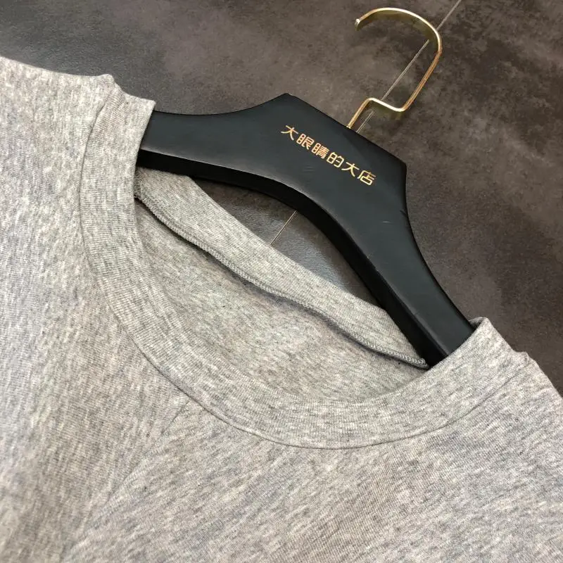 autumn new English letter printing back cross big bow T-shirt female