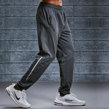 Men Sports Running Pants loose quick drying zipper Pockets autumn winter football training fitness casual jogging Gym Trousers