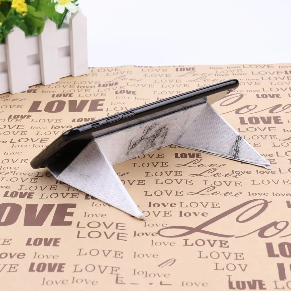 Origami tablet holder Ultra-Thin Bracket Tablet Laptop Desktop Folding Bracket Lazy Mobile Phone Holder Bracket tablet stand