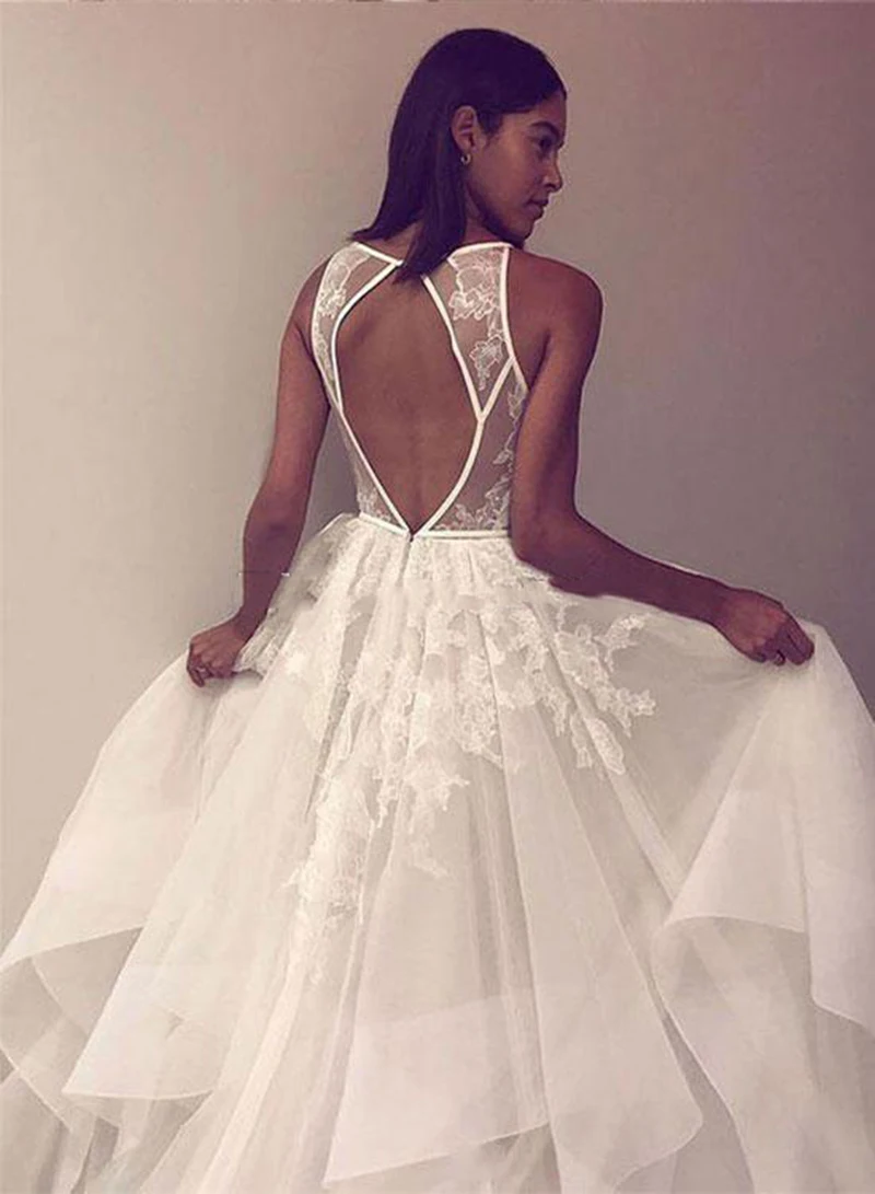 

Gorgeous A Line Wedding Dresses Spaghetti Straps Appliques Lace Tulle Wedding Gowns Sweep Train Backless Customize Bridal Dress