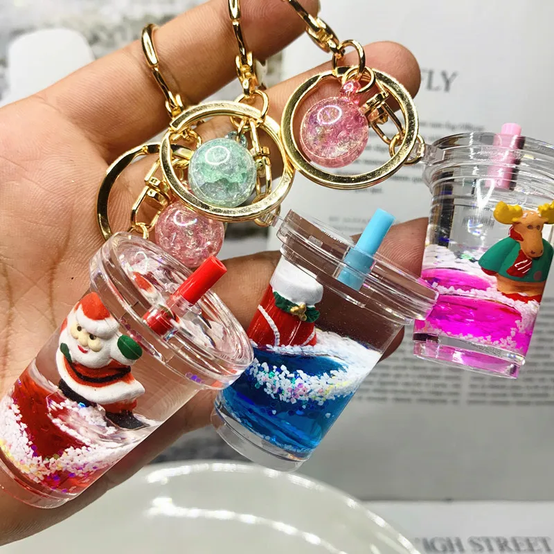 

2021 new Christmas floating acrylic liquid quicksand key chain Christmas decorations milk tea Pendant