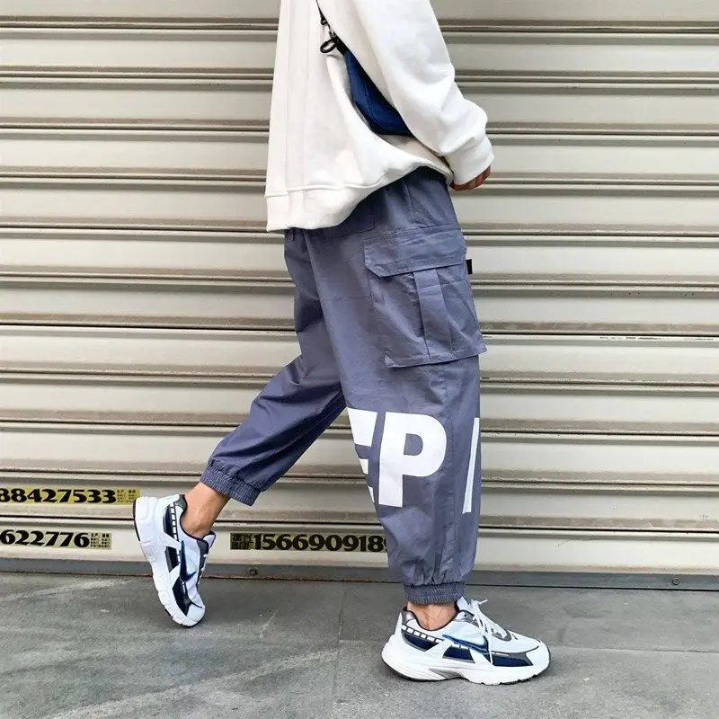 

Men's Autumn New Casual Pants Overalls Loose Trendy Feet Hong Kong Style Sports and Leisure Students Nine-point Pants