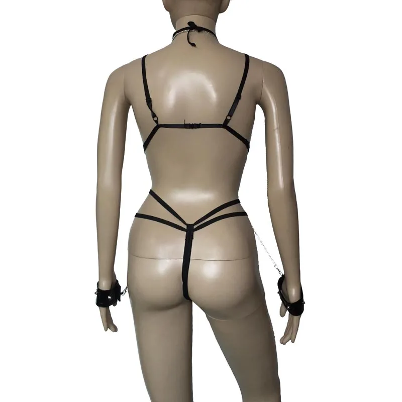 Women Sexy PU Leather Bodysuit Open Crotch Erotic Leotard Teddy Studded Body Harness Cupless Bodysuit with Chained Wrist Cuffs