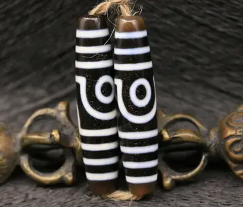 

A pair of Tibetan Black&white 2 eye 7 lines Love totem dZi Bead Totem 58mm Amulet From LKbrother Sauces