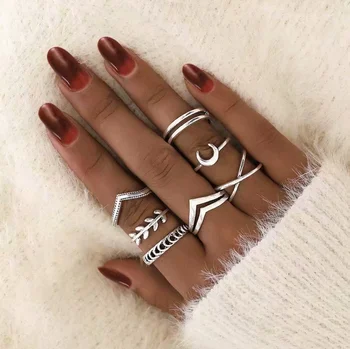 

pack of 7 creative knuckle rings with metal embossed leaf /moon design in burnished