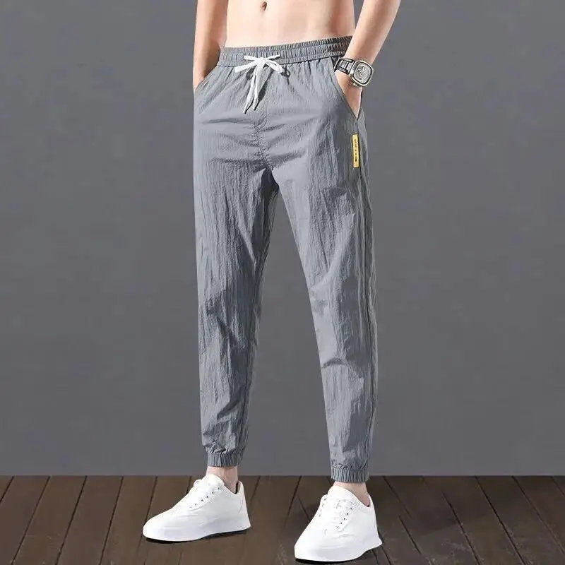 Pantalones de lino y algodón para hombre, de alta calidad, cordón en la cintura, de cintura media, lápiz, holgados, bombachos, informales