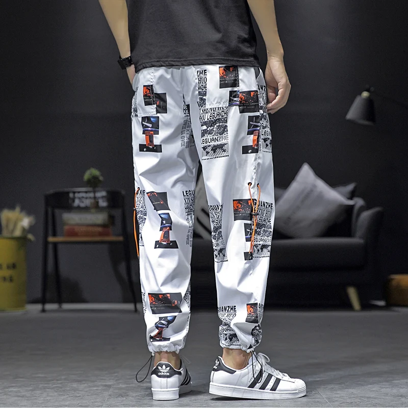 Новинка года; фирменные мужские шаровары с героями мультфильмов; большие размеры; Хип-хоп брюки; уличная одежда; спортивные брюки; повседневные модные брюки-карго