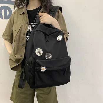 

Little Daisy Backpack Men and Women Korean Casual College Students Schoolbag Personality Round Label Girl Campus Backpack Tide