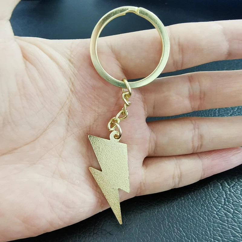 Rock ‘no roll music lovers! God give this Red and Blue Lightning Bolt keychain as a gift to us (2)