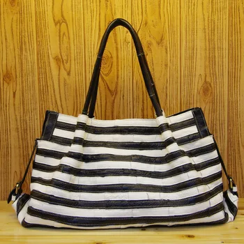 

Leather Head Layer Cowhide Black And White Stripe Split Joint Tide Package Leisure Time Bale Single Shoulder Woman Package
