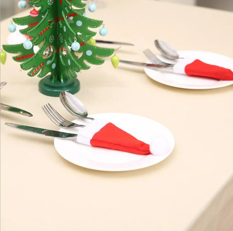 

Hot Sale 2019 1PC Christmas Decorative tableware Knife Fork Set Lovely Christmas Hat Storage Tool enfeites de natal