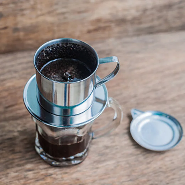 Video su Qual è Cestello per Filtri di Caffè all'Ingrosso a Forma di 330X127mm per Uso in Caffetteria Alta Capacà per Macchine da Caffè Commerciali